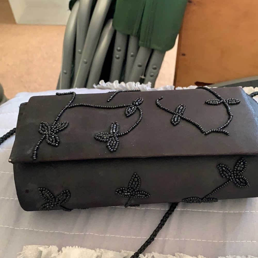 Clutch purse with shoulder strap